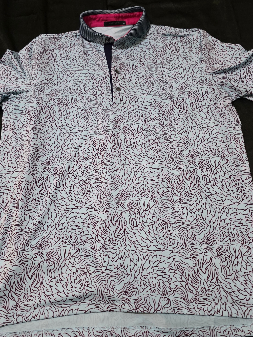 Greyson"Den of Thieves" men's golf polo in a blue and purple wolf print